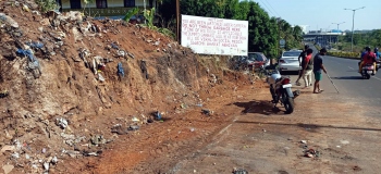 Locals use own funds to clear garbage site at Shantinagar