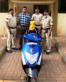 Scooter theft suspect held