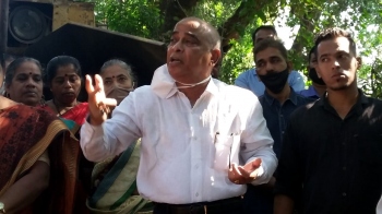 Request locals to meet me over Mopa road: Deputy CM
