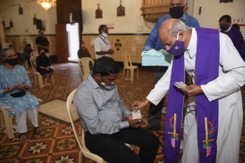 Limited congregations, modified services mark Ash Wednesday