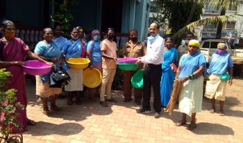 Ex-chairperson gives cleaning aids to civic workers in Vasco