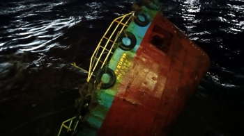 Loaded barge sinks: 1 dies, 7 rescued
