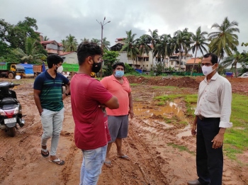 Opposition to dumping of mud on MMC parking land at Madel