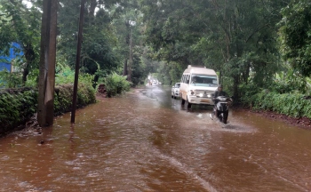 Poor gutter system leaves Honda road inundated