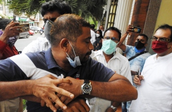 Commotion outside Dinesh Gundu Rao's hotel