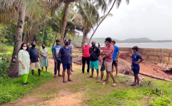 Damaged during cyclone, retaining wall endangers houses in Hollant