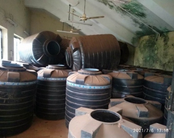 Water tanks stored in rooms meant for public utility