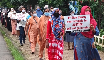 Citizens hold silent march to pay tribute to late Fr Stan