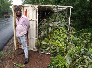 Pick-up skids, falls on side at Loliem, driver and cleaner escape unhurt