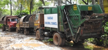 Some trucks laden with garbage parked at Old Market garage