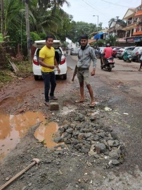 Calangute youth fills up potholed roads