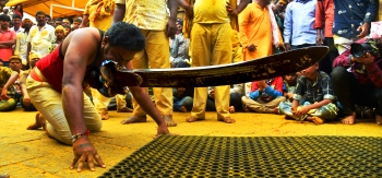 Lifting the 42-kg 'khanda' for victory on Dussehra