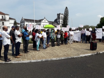 Protestors chide govt over transfer of ASI official