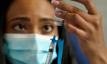 Are new COVID variants like Omicron linked to low vaccine coverage?