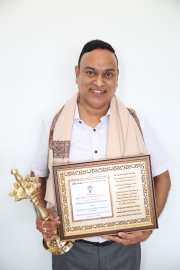 SAG felicitates coach Warlikar for completing PhD