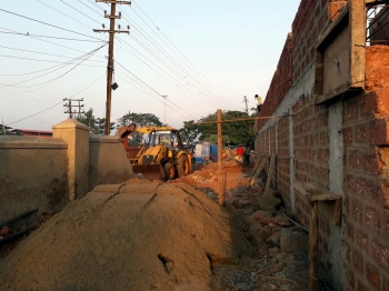 Demolition of major portion of old GMC wall gives displaced kiosk owners more hope