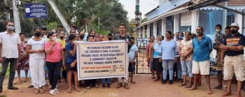 Carmona locals protest over lock on gate to govt school complex