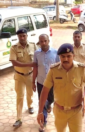 One held for cheating in purchase of land