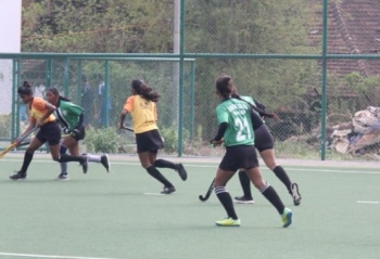 St Xavier's win hockey double
