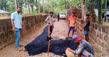 Sarpanch repairs road with his own money