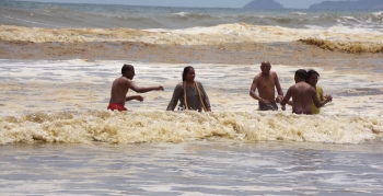 Domestic tourists have ball of a time despite brown water at Colva beach