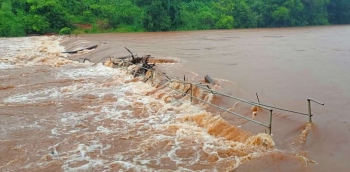 Paikul footbridge submerged as Ragada river rises sharply