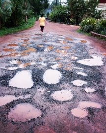 Internal road to hell after heavy rains in Benaulim
