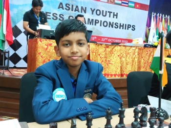 Ethan wins double gold at Asian Youth Chess C'ship