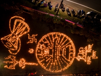 5,001 oil lamps lit outside temple in Chicalim