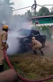 Parked car catches fire at Mandur