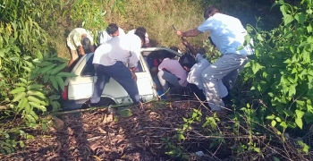 Lucky escape for two as car goes off bypass at Galgibaga