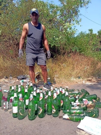 Activist dumps empty beer bottles outside Mormugao council bldg