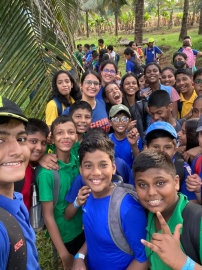 Rosary HS marks Children’s Day with visit to farm