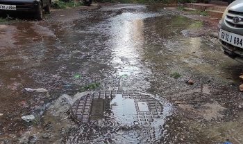 Torrid time for pedestrians as wastewater flows onto steps near old Collectorate