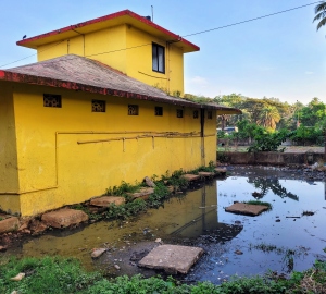 Cesspool outside Sulabh toilet at SGPDA market