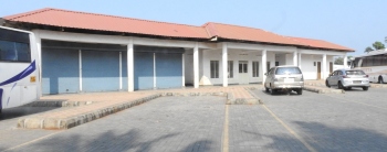 Bus stand facility for railway passengers remains idle