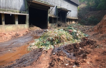 With no place inside the plant, fresh waste dumped outside