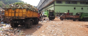 Stranded garbage-laden trucks begin unloading waste at Sonsodo shed
