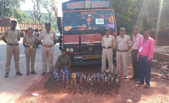Excise team seizes tempo with 70 ltrs of liquor at Anmod
