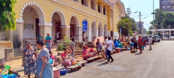 Vasco fish market vendors protest by selling fish outside council building