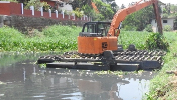 Sal desilting project contractor finally starts de-weeding work